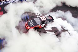 Kyle Busch does a burnout on the start/finish line after becoming the first NASCAR Nationwide Series driver after 23 races to become a repeat winner at New Hampshire Motor Speedway Saturday in Loudon, N.H. Credit: Todd Warshaw/Getty Images for NASCAR